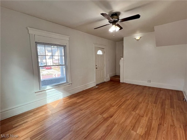 foyer featuring ceiling fan and light hardwood / wood-style floors