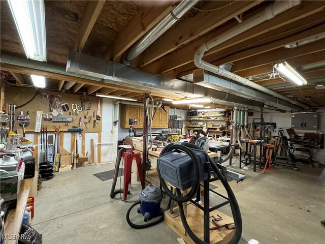 basement with a workshop area