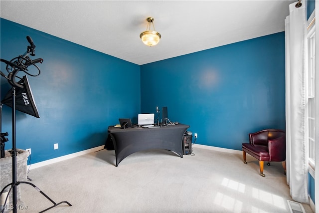 home office featuring light colored carpet