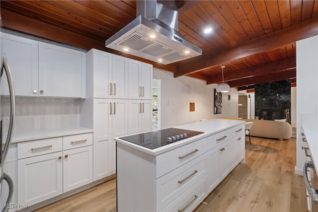 kitchen featuring light wood-type flooring, ventilation hood, and wood ceiling