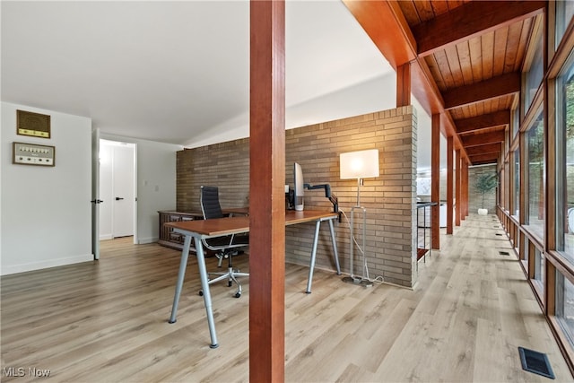 office space featuring light hardwood / wood-style floors, vaulted ceiling with beams, and wooden ceiling