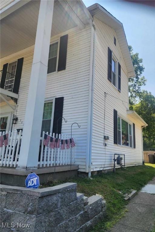 view of home's exterior featuring covered porch