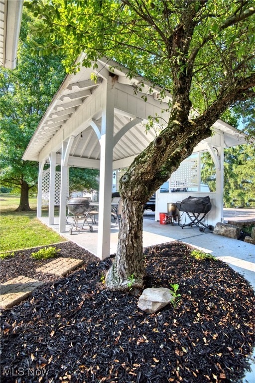 exterior space with a gazebo and a patio