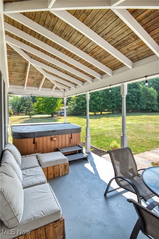 view of patio featuring a hot tub