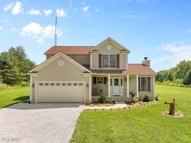 front of property with a front yard and a garage