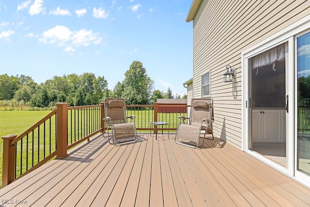 deck featuring a yard