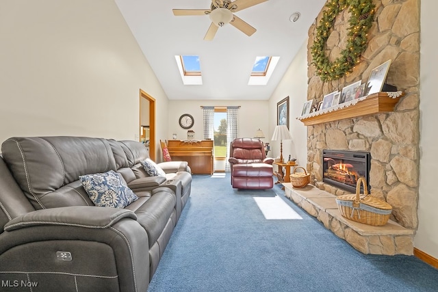 living room featuring carpet, high vaulted ceiling, a fireplace, and ceiling fan