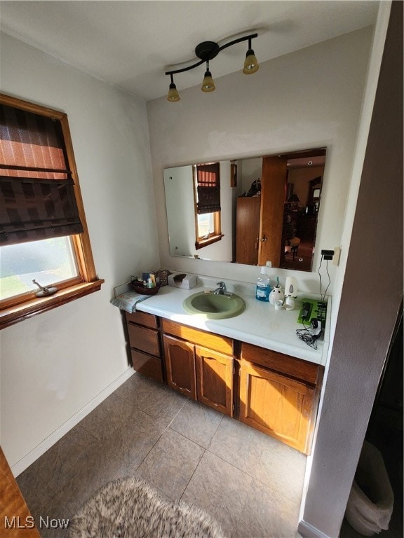 bathroom featuring vanity and tile patterned flooring