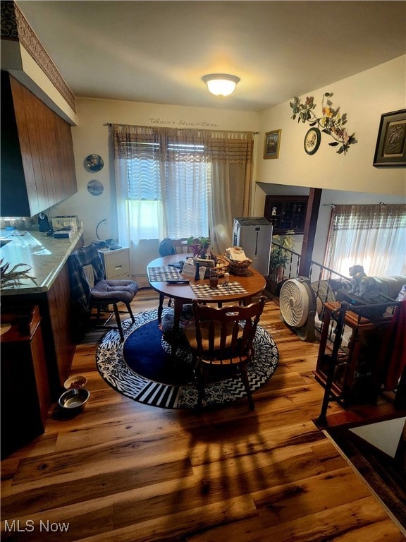 dining area featuring wood-type flooring