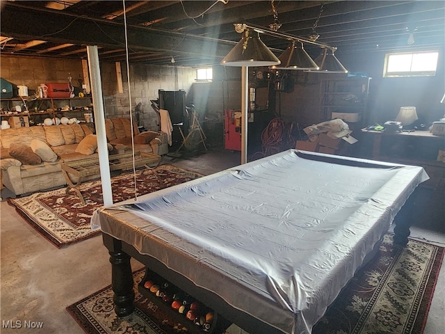 playroom featuring pool table and concrete flooring