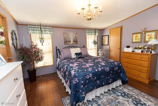 bedroom featuring dark wood-type flooring, a notable chandelier, and ornamental molding