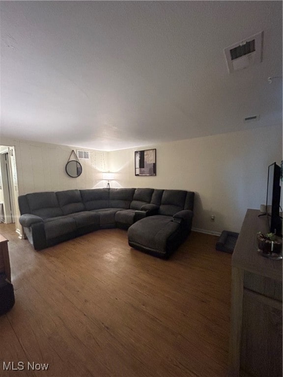 living room with wood-type flooring