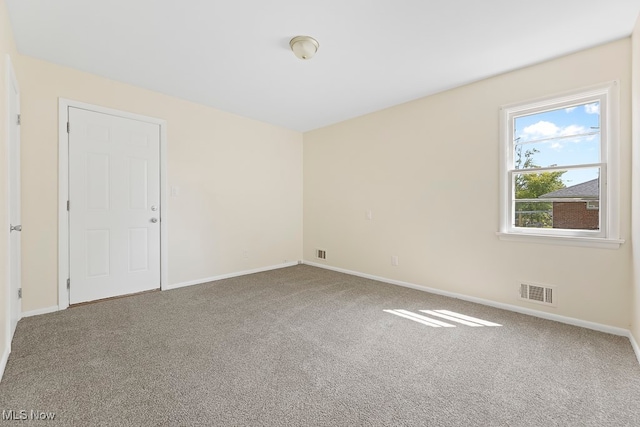 view of carpeted spare room