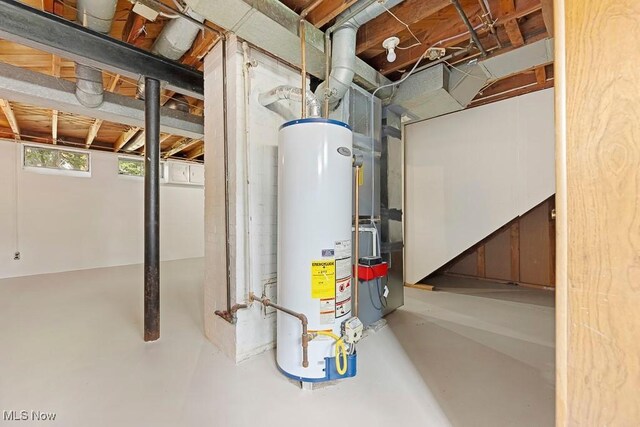 utility room with water heater