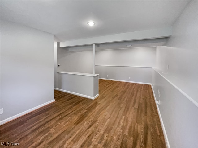 basement featuring hardwood / wood-style floors