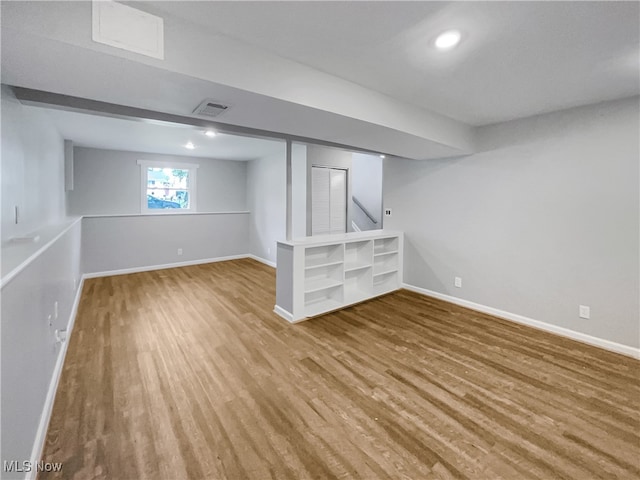 basement with wood-type flooring