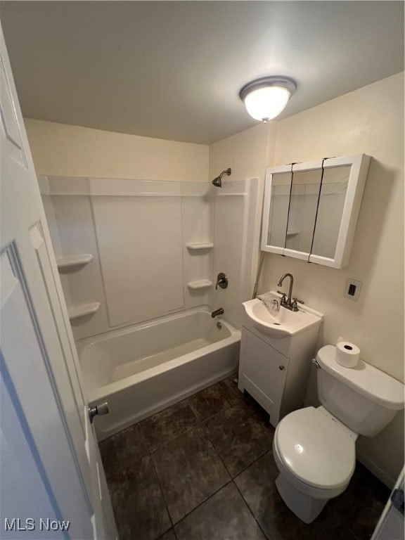 full bathroom with toilet, bathtub / shower combination, tile patterned floors, and vanity