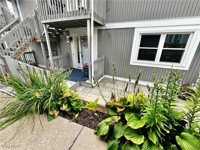 doorway to property featuring a patio