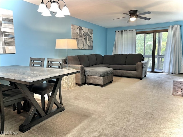 living room with light colored carpet and ceiling fan