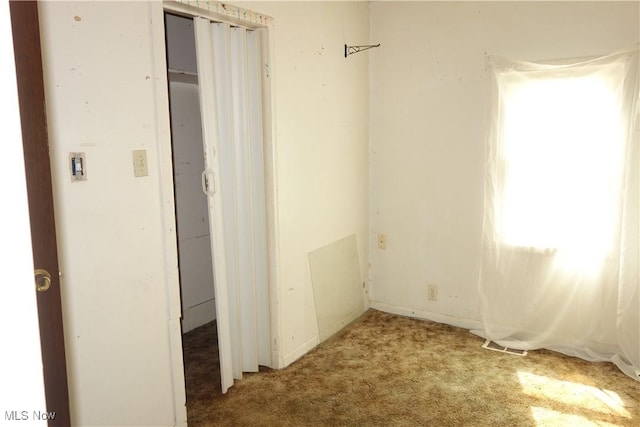 spare room with carpet flooring