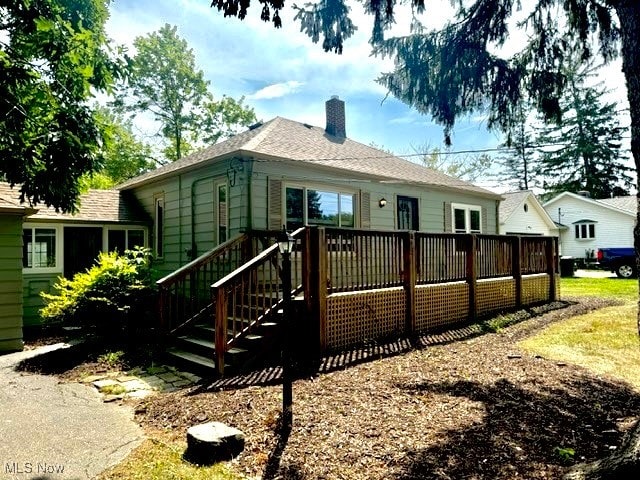 view of front of house with a deck