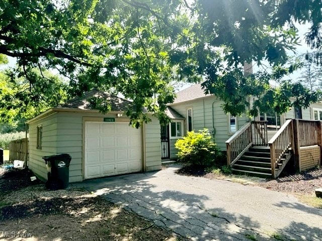 view of front of property with a garage