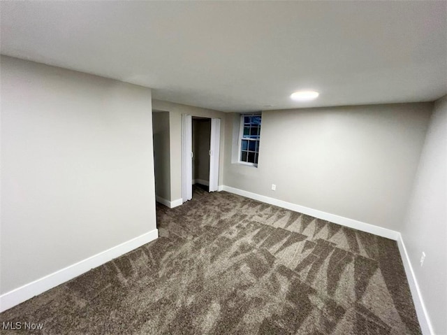 spare room featuring carpet flooring