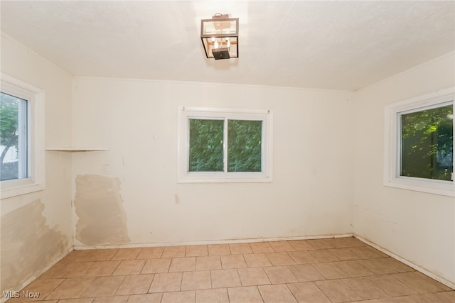 view of tiled spare room