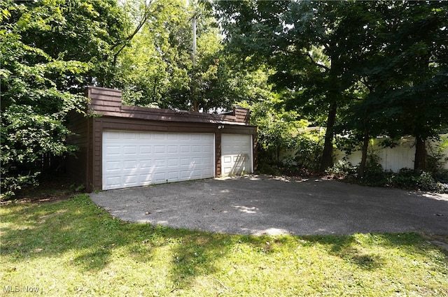 garage with a lawn