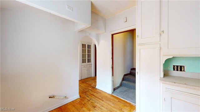 hallway featuring light hardwood / wood-style flooring