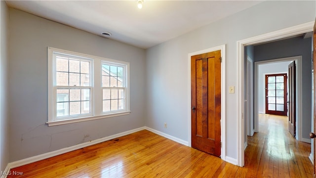 unfurnished bedroom featuring light hardwood / wood-style floors