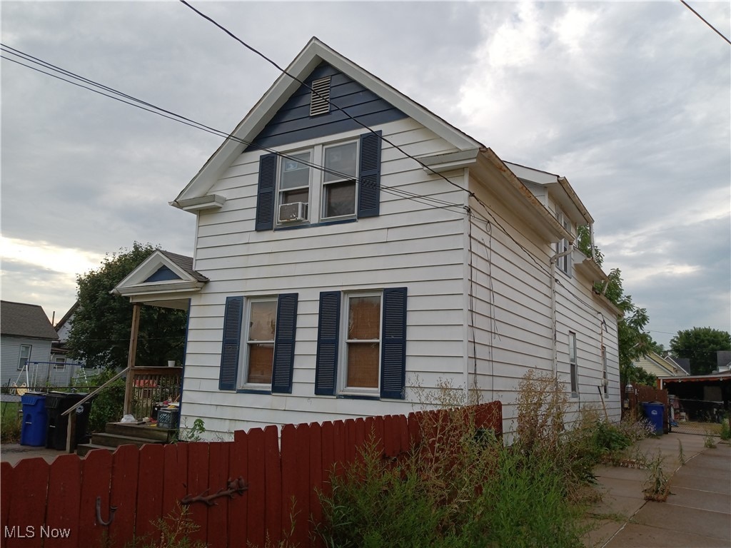 view of home's exterior featuring cooling unit