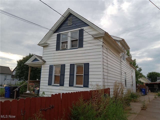 view of home's exterior featuring cooling unit