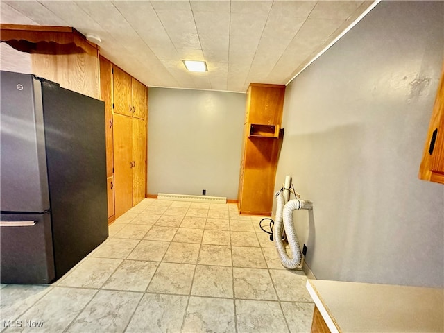 kitchen featuring stainless steel fridge