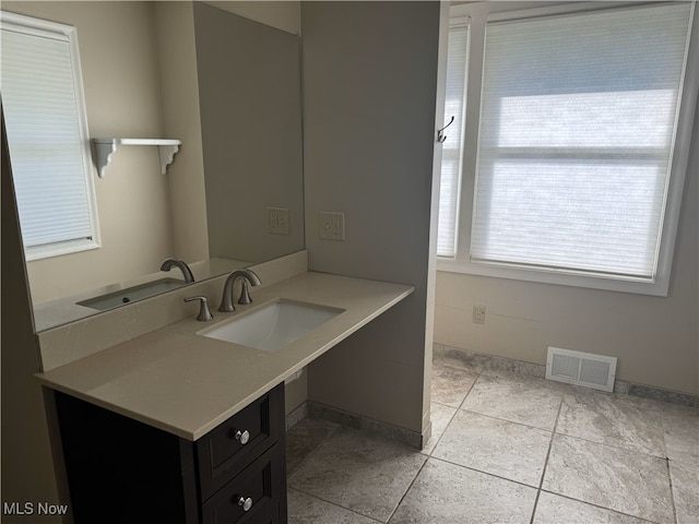 bathroom featuring vanity and tile patterned floors