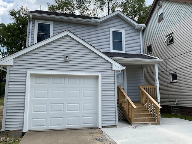 view of front of property featuring a garage