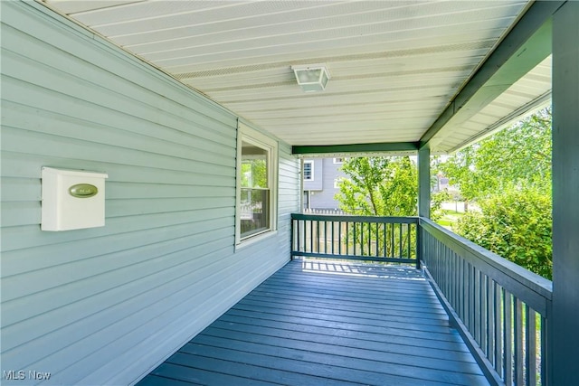 wooden deck featuring a porch