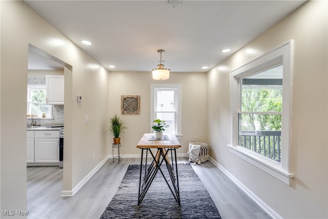 office space with light hardwood / wood-style floors