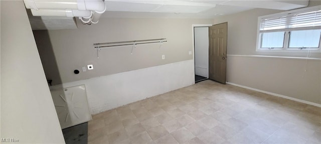 clothes washing area with laundry area and tile patterned floors