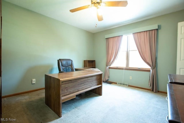 office space featuring carpet floors and ceiling fan