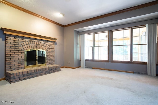 unfurnished living room featuring a fireplace, crown molding, a textured ceiling, and light carpet