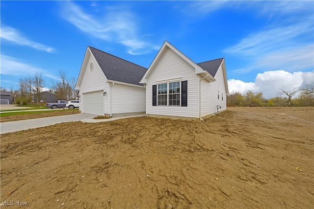 view of property exterior with a garage