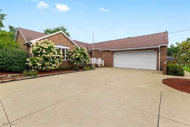 single story home with a garage