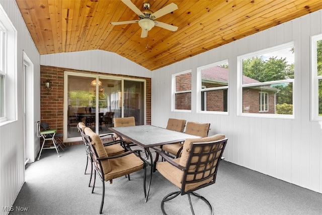 sunroom / solarium with ceiling fan, wood ceiling, and vaulted ceiling