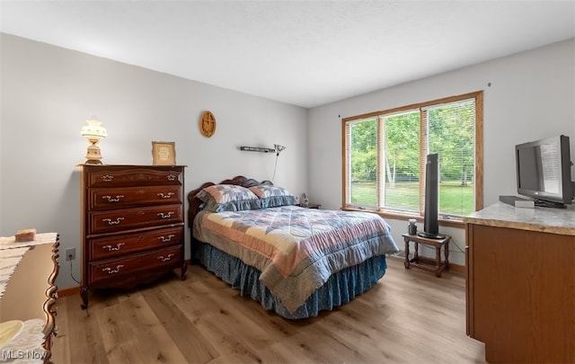 bedroom featuring light hardwood / wood-style flooring