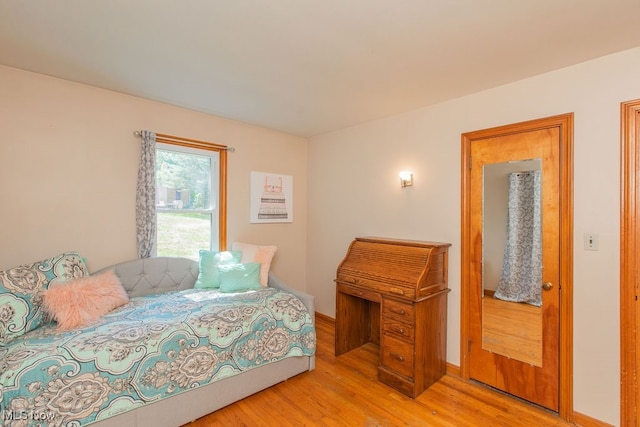 bedroom with light hardwood / wood-style flooring