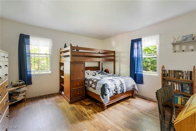 bedroom featuring dark hardwood / wood-style floors