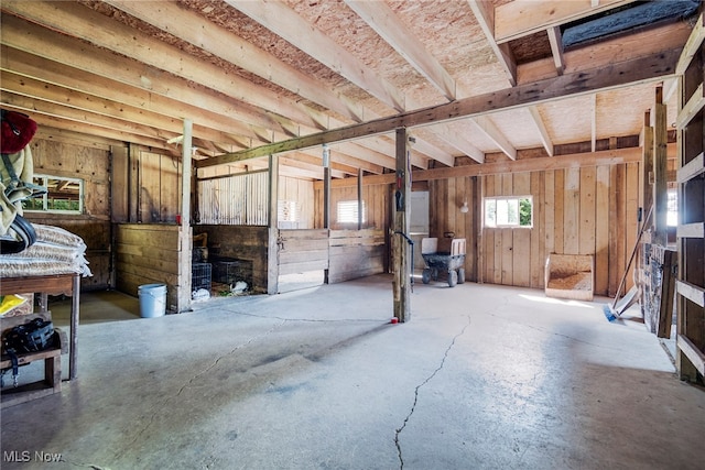 misc room with concrete floors