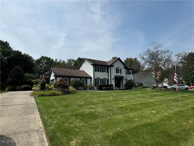 view of front facade with a front lawn