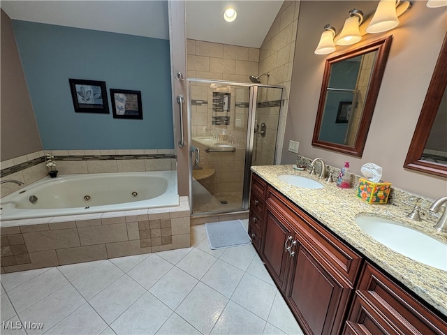 bathroom with vanity, tile patterned flooring, and shower with separate bathtub